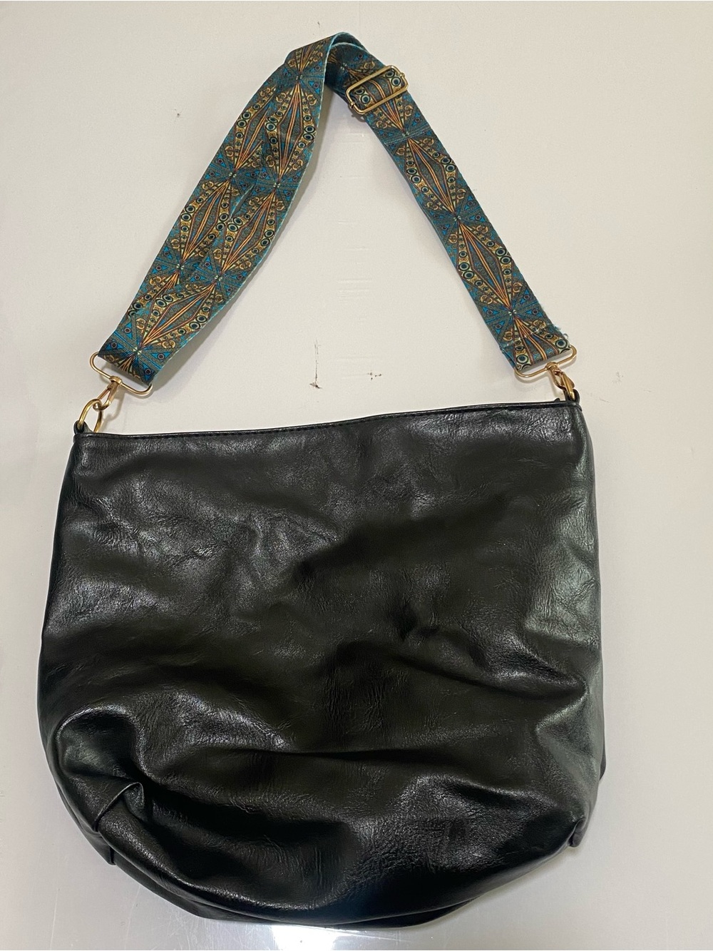 Black Leather Shoulder Bag with Patterned Blue-Tan Strap